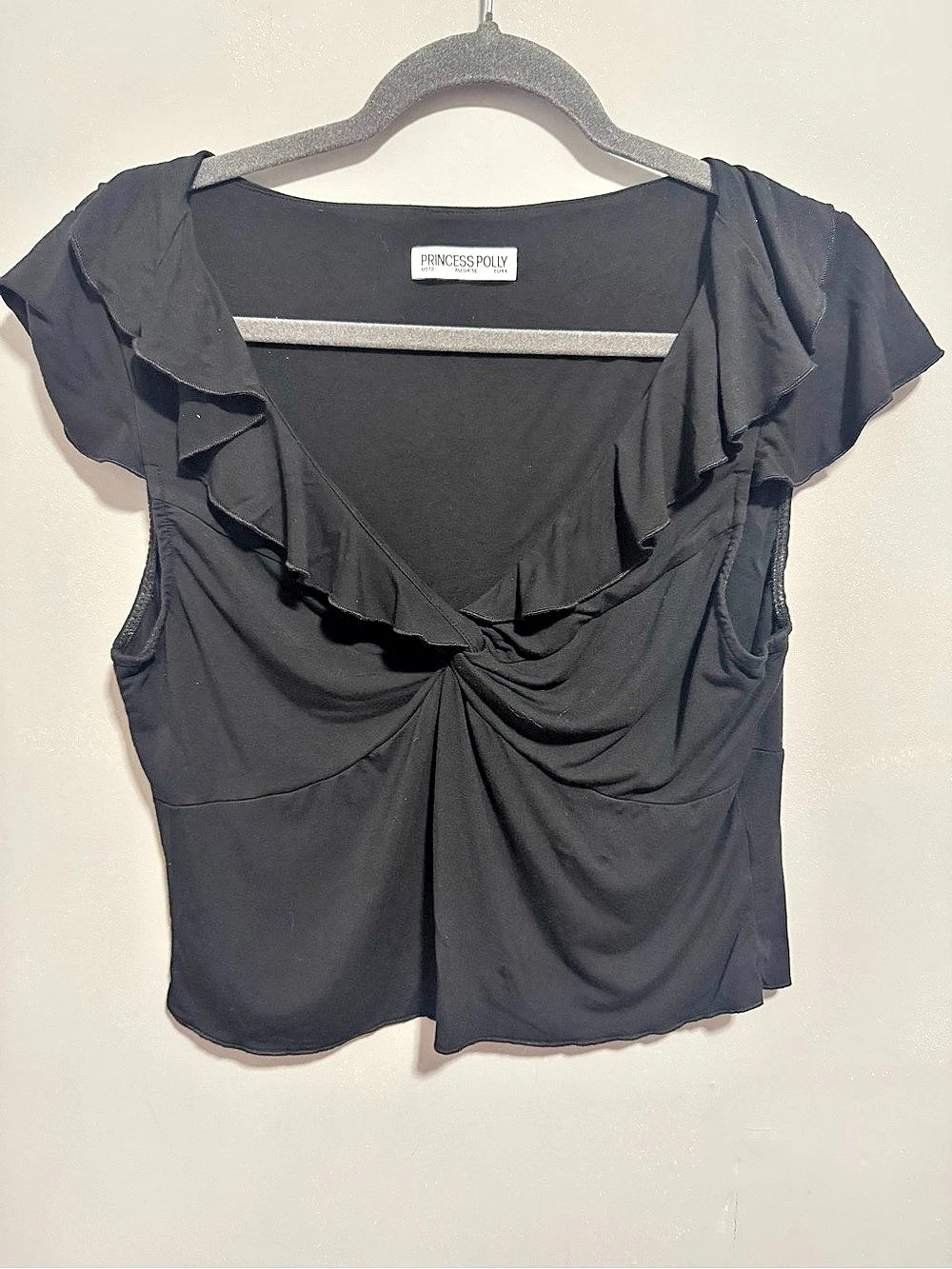 Princess Polly- Black Ruffle Short Sleeve V-neck Top Size 12.